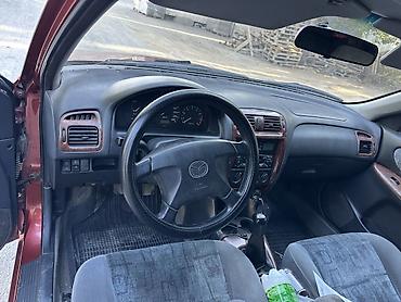 годф 3: Mazda 626: 1998 г., 1.8 л, Механика, Бензин, Хэтчбэк — 5