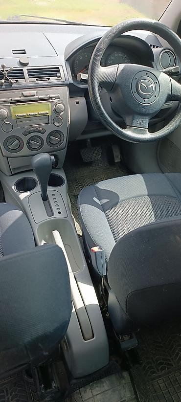 митсубиси спейс стар: Mazda Demio: 2003 г., Автомат, Бензин, Хэтчбэк — 3