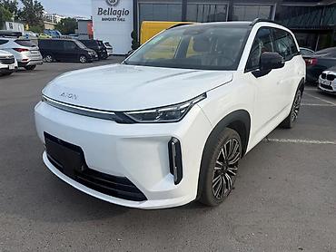 aion 60i: AION i60 — электрический кроссовер белого цвета. Кузов и дизайн: - — 2