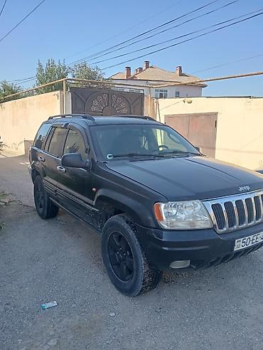 smart car: Jeep Grand Cherokee: 2.7 l | 2003 il Ofrouder/SUV — 3