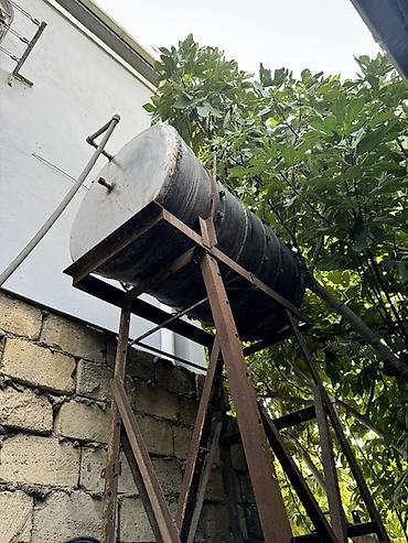 Su çəni dəmir deyil nerjavikadı. Təqribi 2 ton olar bəlkədə biraz çox
