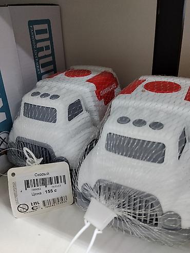 Игрушечная машина «Скорая помощь». Корпус выполнен в виде