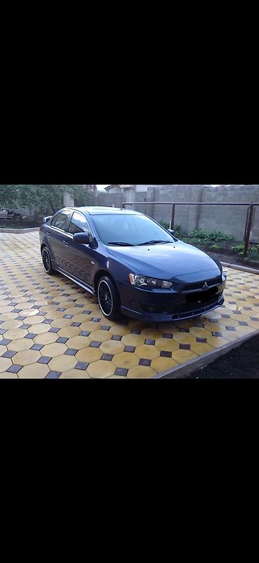 l200 mitsubishi: Mitsubishi Lancer: 1.6 l | 2006 il Sedan — 1