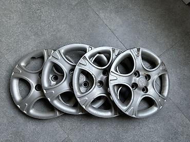 Комплект оригинальных колпаков KIA (4 шт.) R14