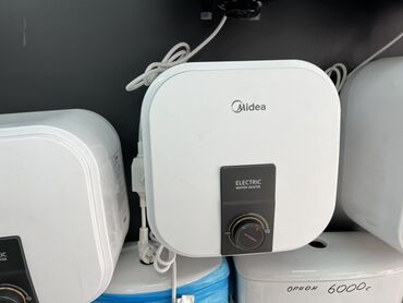 вода кулер: Компактный электрический водонагреватель Midea. Особенности: -