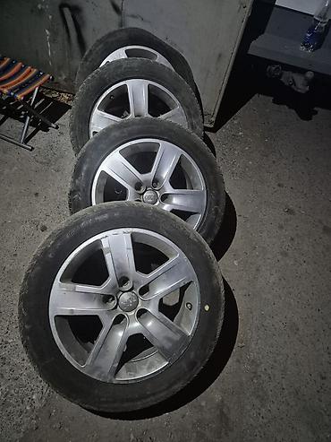 Комплект из 4 колес Audi: литые диски + шины. - Диски: оригинальные