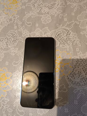 telefon şəkli: Realme C35, 128 GB, rəng - Yaşıl, Barmaq izi, Face ID