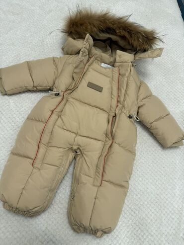 мурской шуба: Детский зимний комбинезон-конверт бежевого цвета - Теплый