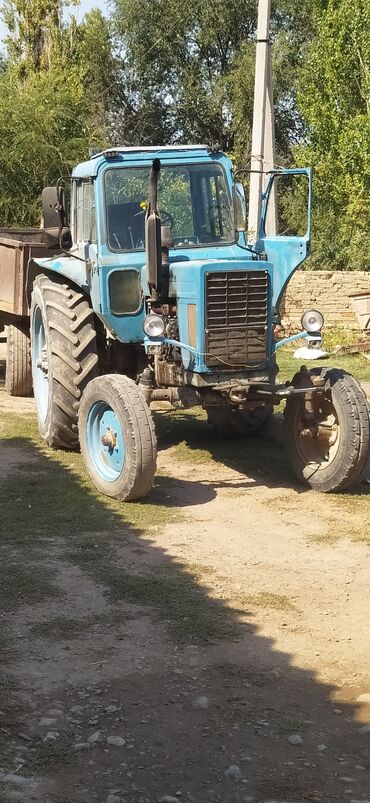 Тракторы МТЗ (Беларус): Трактор МТЗ «Беларус» с кабиной, сзади трехточечная навеска и ВОМ — 15