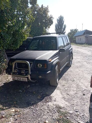 suzuki скутер: Suzuki Sidekick: 1995 г., 2 л, Автомат, Бензин, Кроссовер