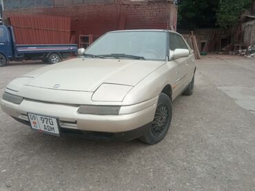 вкуп автомобиля: Mazda 323: 1991 г., 1.6 л, Механика, Бензин, Хэтчбэк