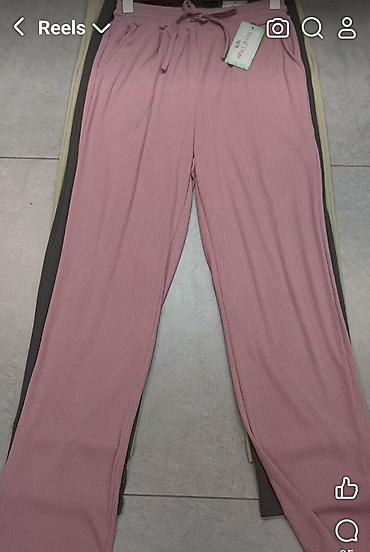 pantalone sat: Pantalone sa dzepovima i elasticnim pojasem na redice. Puder — 1