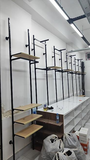 Оборудование для магазинов: Mağaza üçün divar tipli metal asma və rəf sistemi - Material: Qara — 2