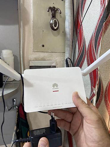 wifi adlari azeri: Huawei OptiXstar Wi‑Fi router/modem - İki antenli güclü Wi‑Fi siqnalı — 1