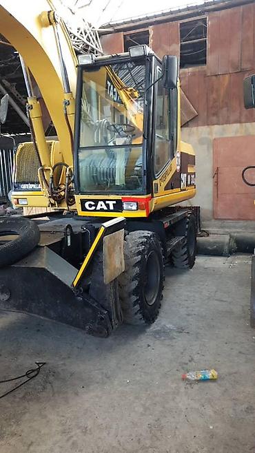 5d полик: Экскаватор, Caterpillar, Колесный — 7