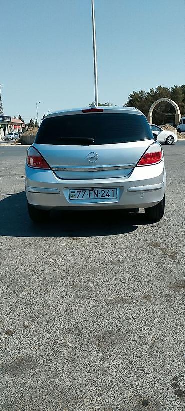üstü açıq maşın: Opel Astra H, 5 qapılı hetçbek - Gümüşü rəng - Benzin mühərriki - Ön — 8