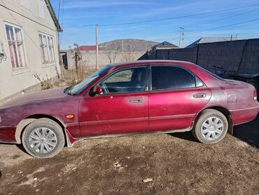 Mazda: Mazda 626: 1993 г., 1.8 л, Механика, Седан — 9