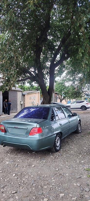 Daewoo: Model: Daewoo Nexia (sedan) Rəng: yaşıl/boz metalik Kuzov: 4 qapı — 2