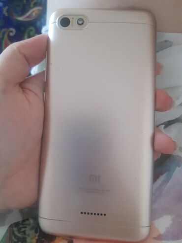 телефон редми а2: Смартфон Xiaomi Redmi 6A в золотистом цвете, модель M1804C3CG. Оснащен