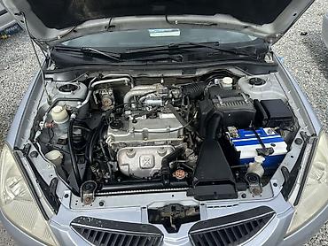 Mitsubishi: Mitsubishi Lancer: 2003 г., 1.6 л, Механика, Бензин, Универсал — 9