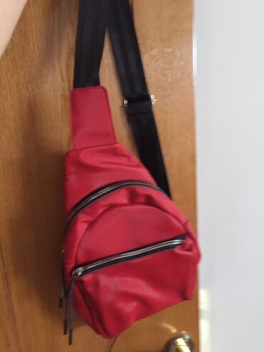 idman çantası: Canta Lc Waikikiden alınıb tezedir qırmızıi