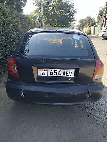 киа рио хетчбэк: Kia Rio: 2003 г., Хэтчбэк — 1