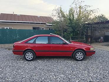 купить мотоцикл сузуки: Mazda 626: 1991 г., 2 л, Механика, Бензин, Хэтчбэк — 7