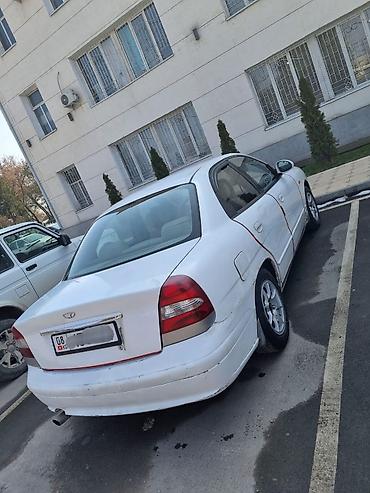 дэу матиз 1: Daewoo Nubira: 2001 г., 1.5 л, Автомат, Бензин, Седан — 1