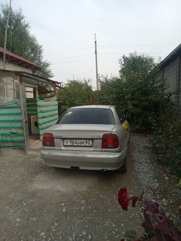 машина 1000: Suzuki Baleno: 1998 г., 1.8 л, Автомат, Бензин