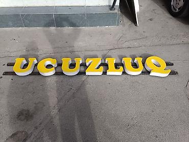 lohvələr: Reklam lövhəsi üçün həcmi hərflər dəsti — “UCUZLUQ” - Material: ön — 1