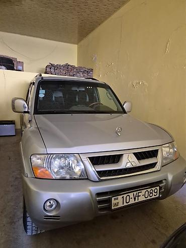 mitsubishi pajero 1995: Mitsubishi Pajero – tam çəkişli (4x4) SUV - Gümüşü rəng, kuzovda — 2