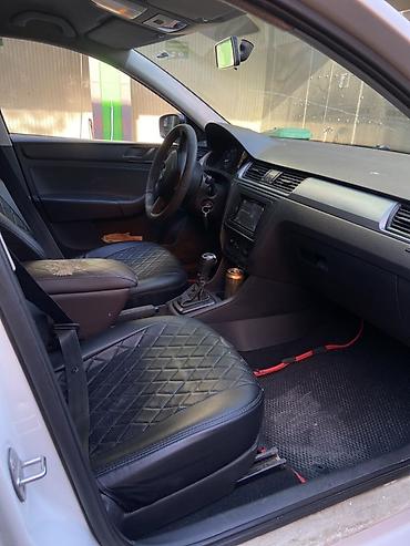 06 шоха: Skoda Rapid: 2016 г., 1.6 л, Автомат, Седан — 8