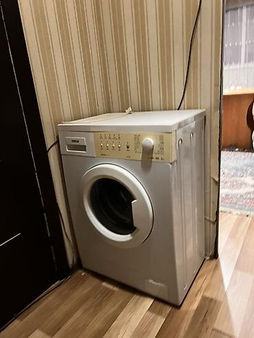 Стиральная машина Indesit, фронтальная загрузка. Характеристики и