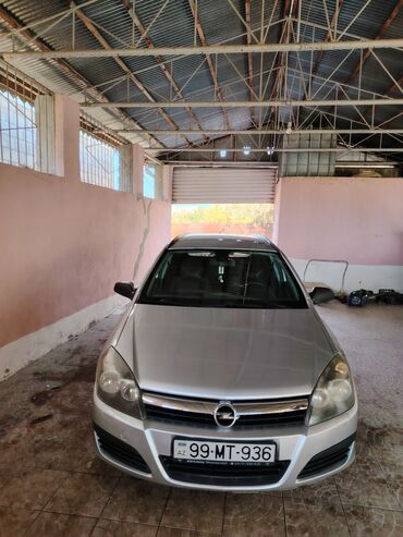 опель аскона запчасти: Opel Astra H hatchback – gümüş rəng. Əsas xüsusiyyətlər: 2006 furqon