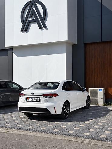 белорус 82 1: Toyota Corolla: 2023 г., 1.8 л, Гибрид, Седан — 4