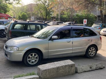машина mazda: Mazda Familia: 2000 г., 1.5 л, Автомат, Бензин, Хэтчбэк