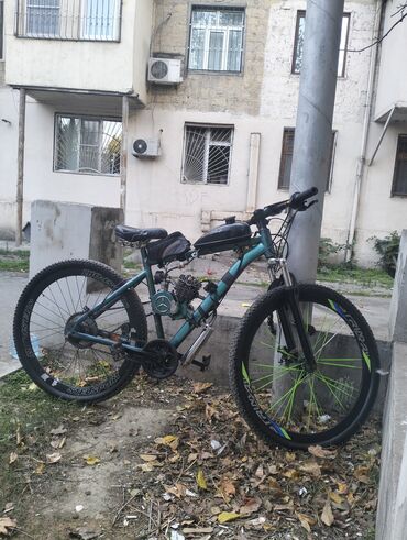 шоссейный велосипед trinx: Benzin mühərrikli velosiped. Təcili satilir endirim var .tək prablem