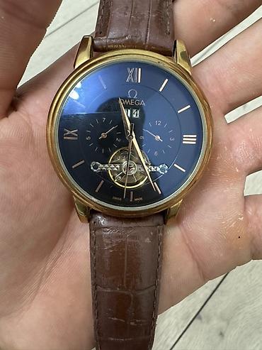 swatch omega купить: Мужские наручные часы с автоподзаводом - Классический круглый корпус — 1