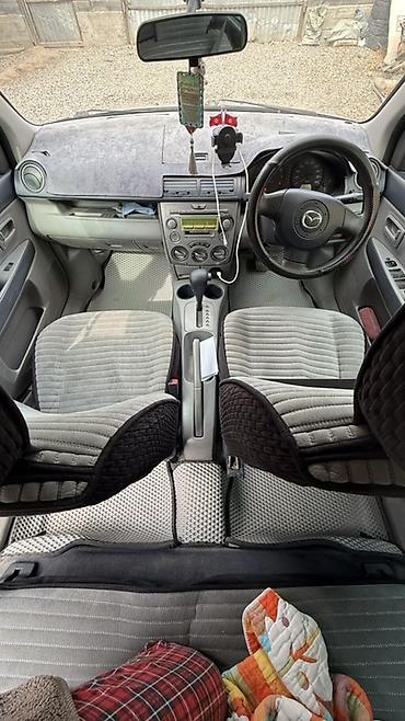 dewo tiko: Mazda Demio: 2003 г., 1.3 л, Автомат, Бензин, Хэтчбэк — 6