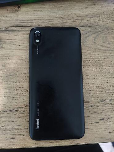 Мобильные телефоны: Redmi, Redmi 7A, Б/у, 32 ГБ, цвет - Черный, 2 SIM — 4