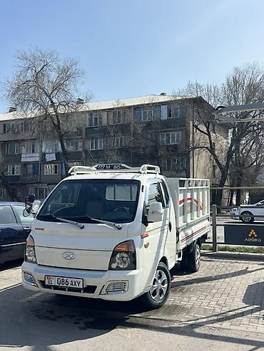 kiya bongo: Hyundai Porter II (бортовой малотоннажный грузовик) - Компактный — 1