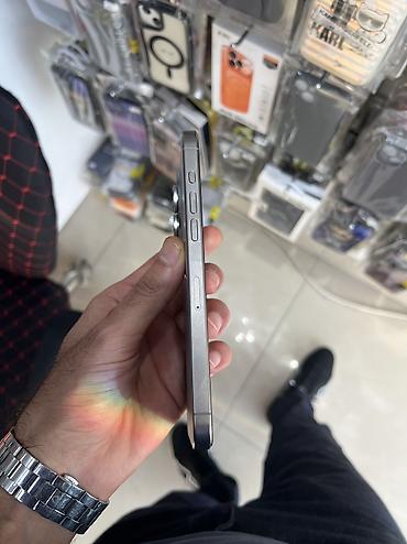 islenmis iphone: IPhone 15 Pro Max, 256 GB, Natural Titanium, Zəmanət, Simsiz şarj, Face ID — 4