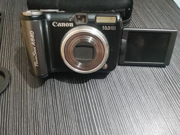 Фотоаппараты: Продаю Canon PowerShot A640 с чехлом. Фотоаппарат в хорошем рабочем