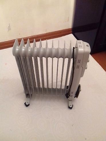 seksiya: Qızdırıcı. Yağ radiatoru "Midea". 11 seksiyası var. İşlək — 1