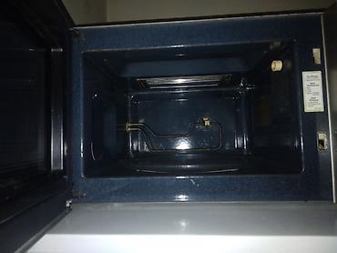 işlenmiş mikrovalnovka: Mikrodalğalı soba Samsung, Ayrıca dayanan, rəng - Gümüşü, İşlənmiş — 2