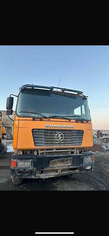 бетона мишалка: Самосвал Shacman в ярком оранжевом цвете с красным металлическим — 1