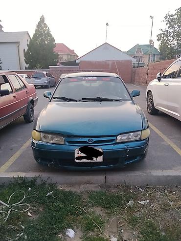 овальный: Mazda 626: 1993 г., 1.8 л, Механика, Бензин, Седан — 1