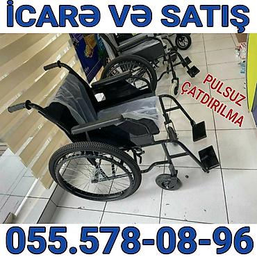 Bu, böyük arxa təkərləri və kiçik ön təkərləri olan qara rəngli əl ilə lalafo.az -da Bu, böyük arxa təkərləri və kiçik ön təkərləri olan qara rəngli əl ilə