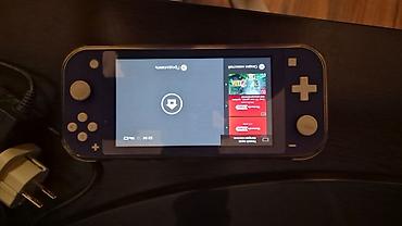 Nintendo Switch: Nintendo Switch Lite (mavi rəng) ideal vezziyet - Portativ oyun — 1