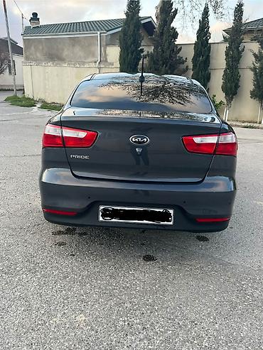 mini kia: Kia Pride: 1.4 l | 2015 il Sedan — 4